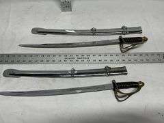 (2) heavy decorative swords