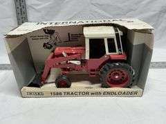 International 1586 tractor with end loader