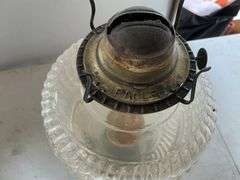 Vintage oil lamp-shade is chipped
