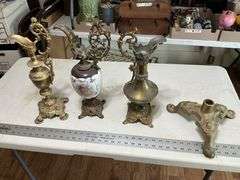 Cast-iron base and heavy decorative pitchers