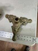 Cast-iron base and heavy decorative pitchers