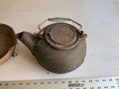 Cast-iron teapot and pans