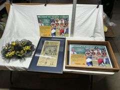 Local football wall hangings and Hawkeyes wreath