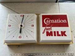 Lighted Carnation clock-lights up/has been