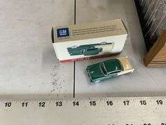 1955 Chevy Bel Air toy car and cassette tapes