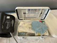 Blood pressure monitor and first aid kit