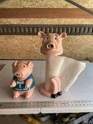 Plastic pig cookie jar and towel holder