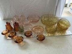 Colored glassware bowls, votive candle holders,