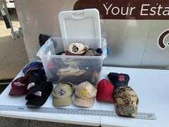 Tote of hats, some need cleaning.