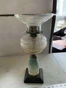 Vintage oil lamp-shade is chipped
