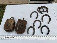 2- wooden pulleys and vintage horseshoes