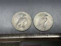 2- 1923 Peace silver dollars