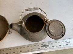 Cast-iron teapot and pans