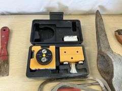 Assorted tools and laser level