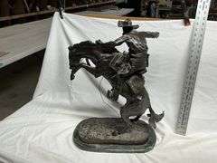 Frederic Remington cowboy with horse statue