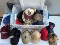 Tote of hats, some need cleaning.