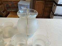 Plastic Kool-Aid pitcher and mugs