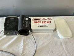 Blood pressure monitor and first aid kit