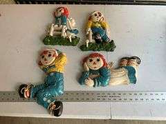 Vintage Raggedy Ann and Andy plastic wall hangings