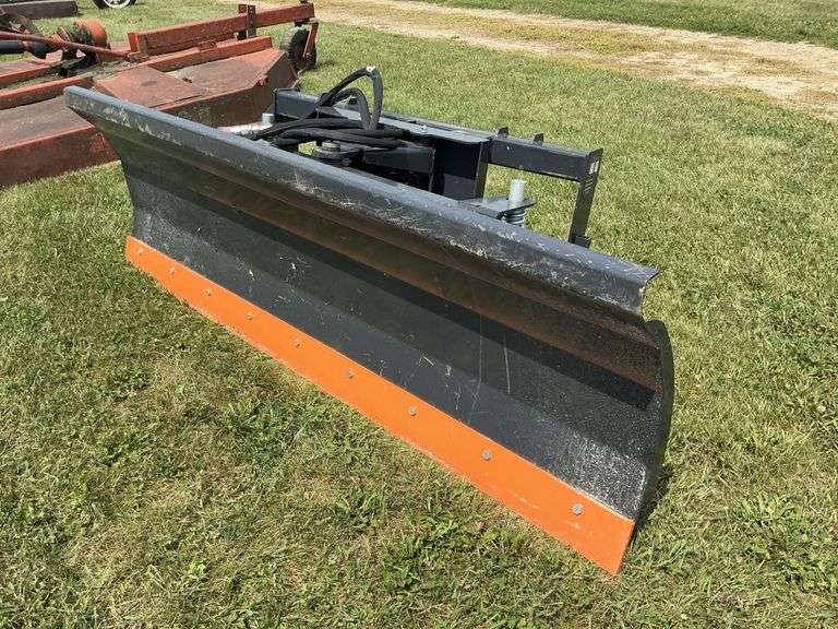 7' Wolverine skid steer blade, hydraulic swivel.