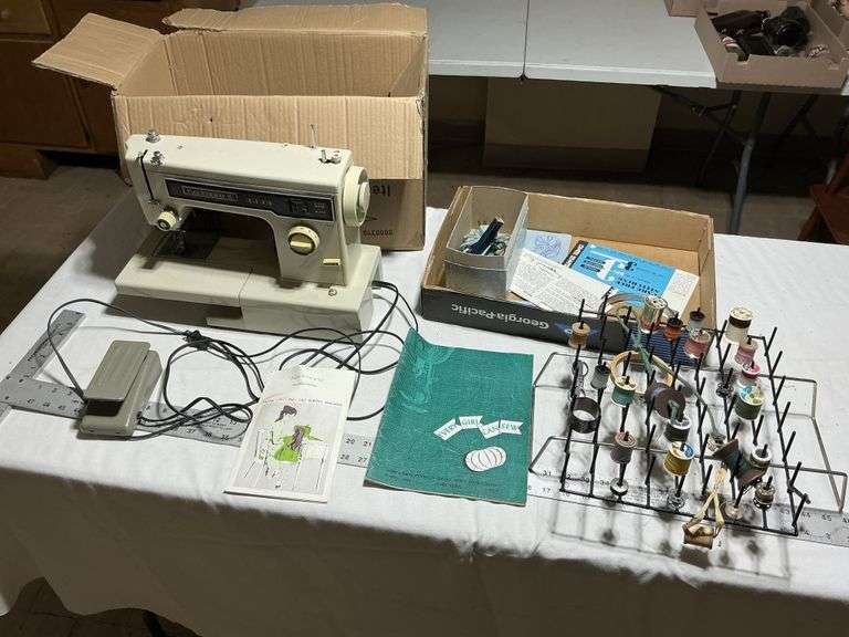 Kenmore 10 sewing machine and supplies