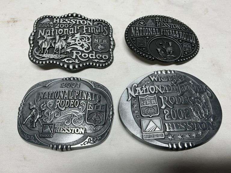 Hesston national finals rodeo belt buckles - Legacy Auction Company