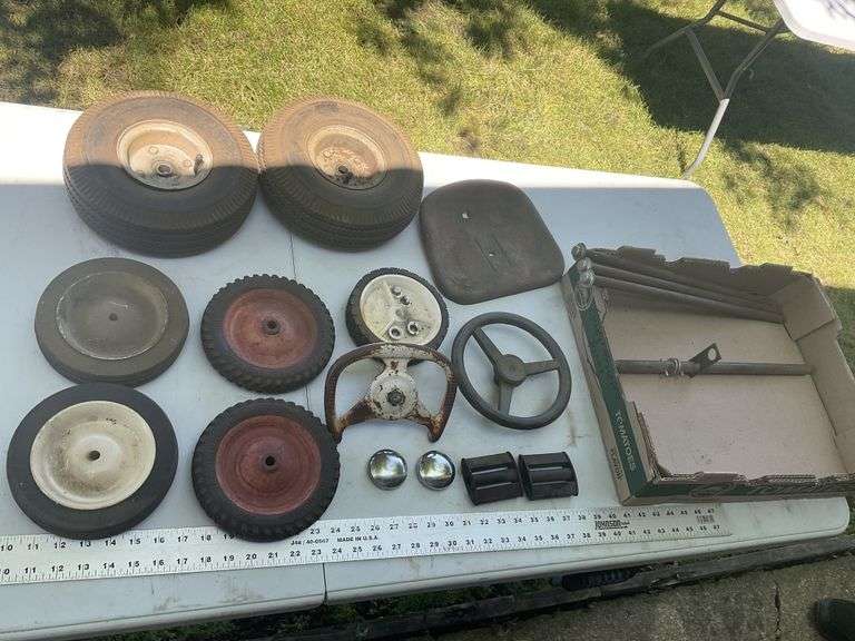 Vintage pedal tractor parts, utility wheels and