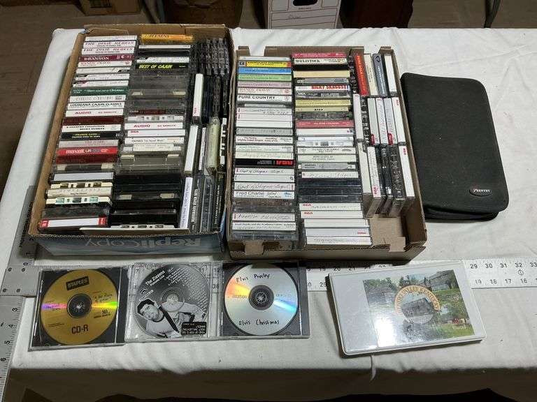 Cassette tapes and CDs and case