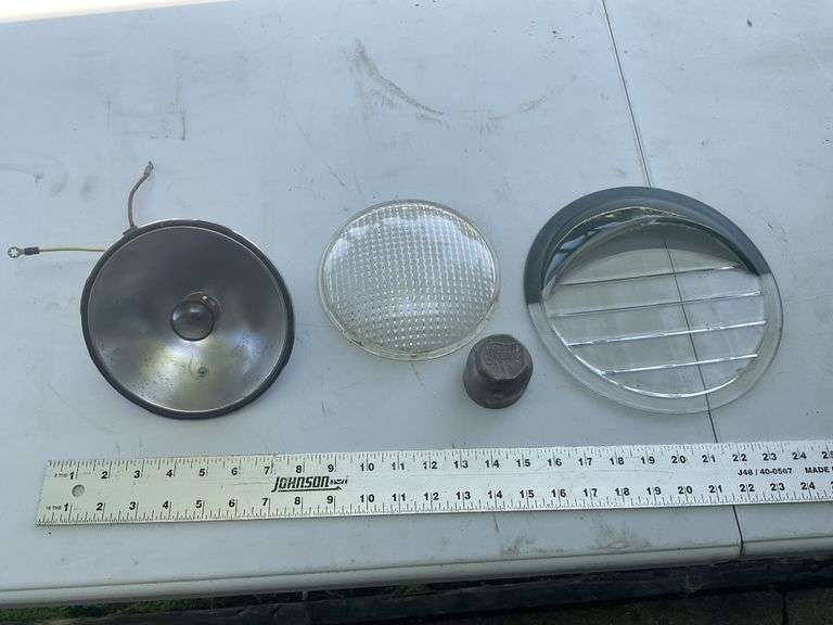Vintage Ford hub cap cover, light bezel etc.