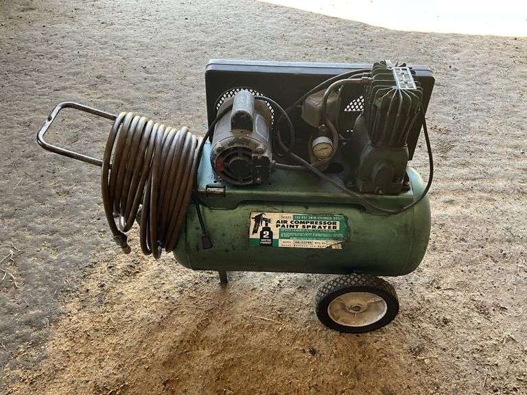 Sears 2 hp portable air compressor with hose. 230