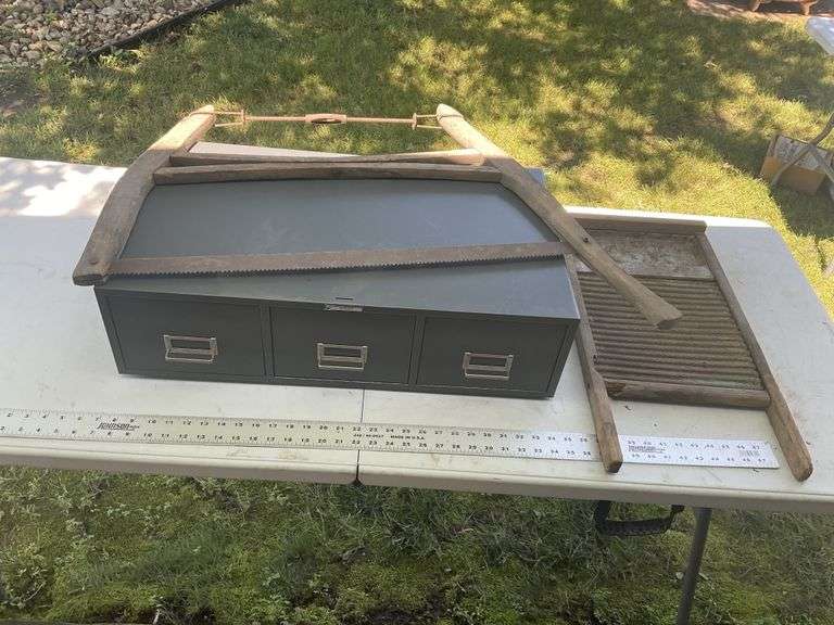 Metal file, bucksaw and washboard