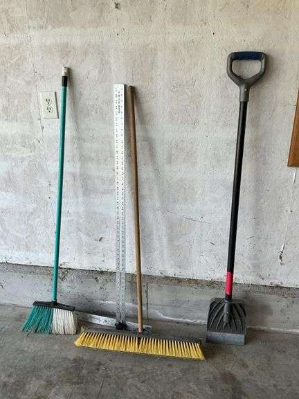 Brooms and ice scraper