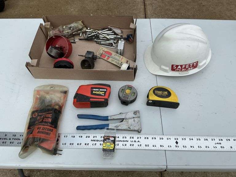 Allen wrenches, hole saws, helmet.