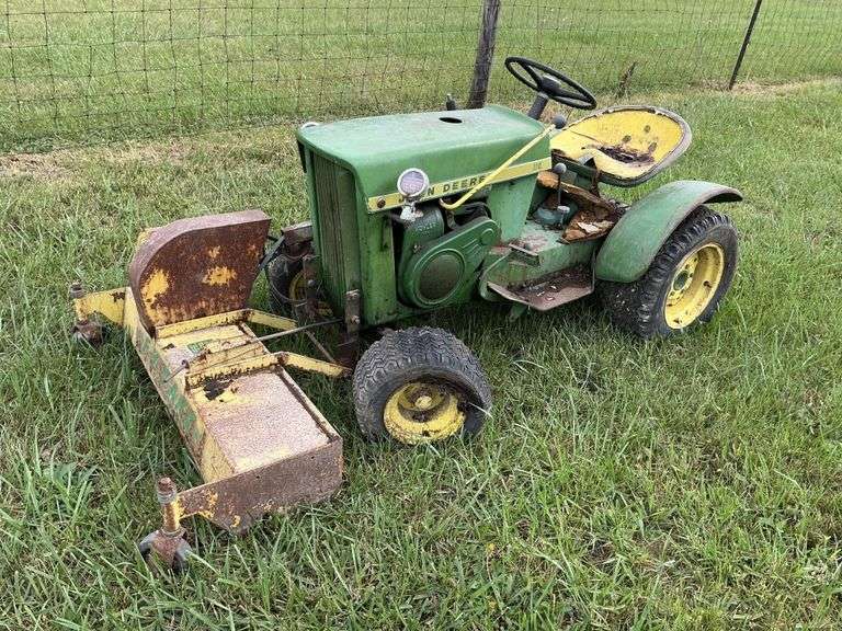 John Deere 110 with E-Z rake