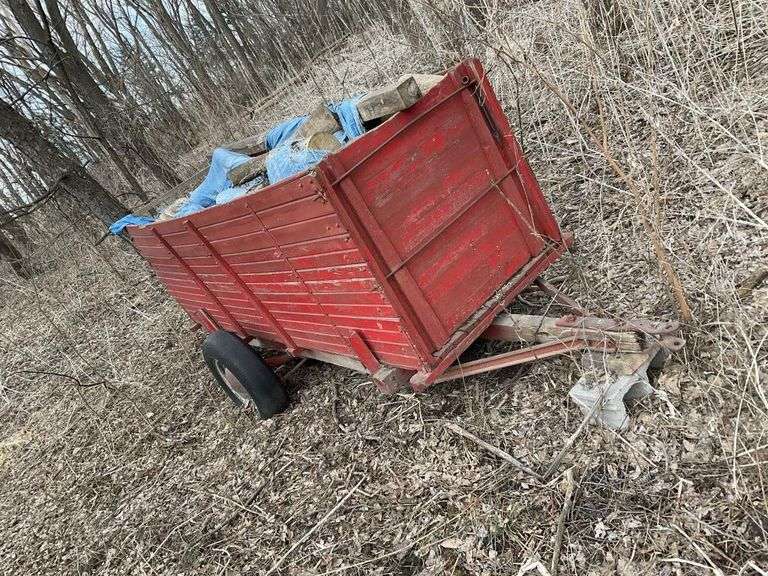 Trailer, and contents of firewood. Tires hold