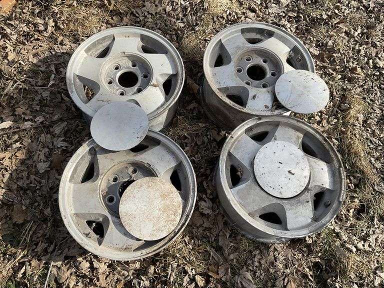 4- 15" GM aluminum wheels with covers