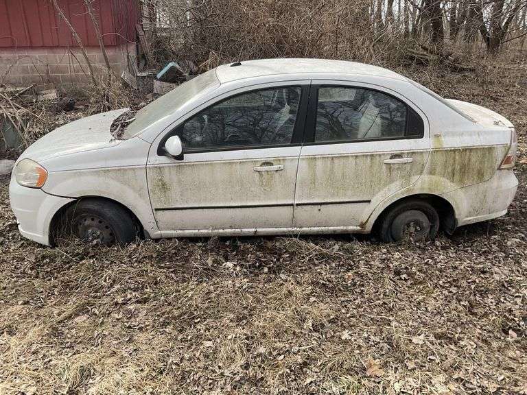 2011 Chevrolet Aveo LT.  As is has title.