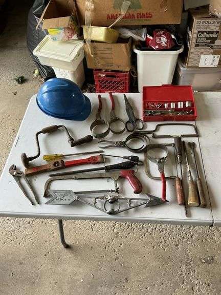 Assortment of tools and helmet