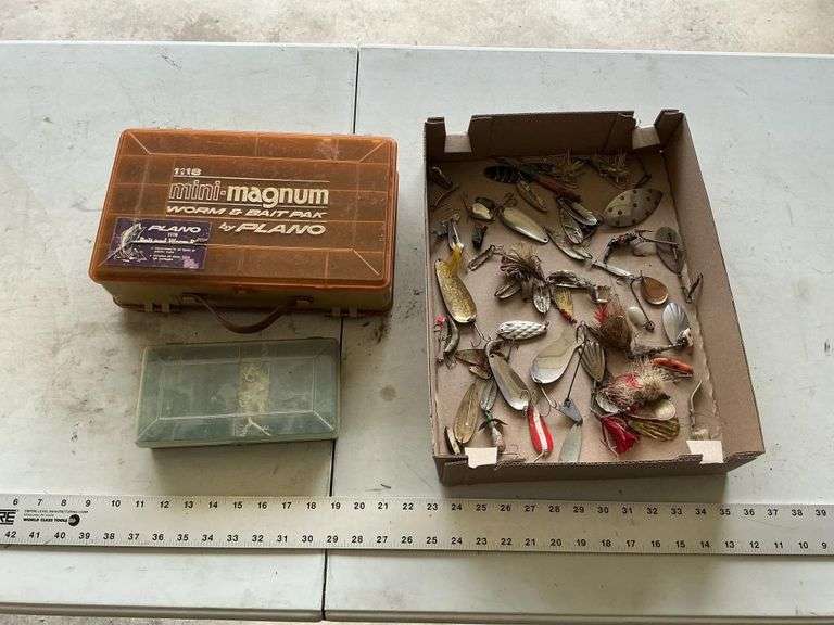 Assorted spoons and tackleboxs
