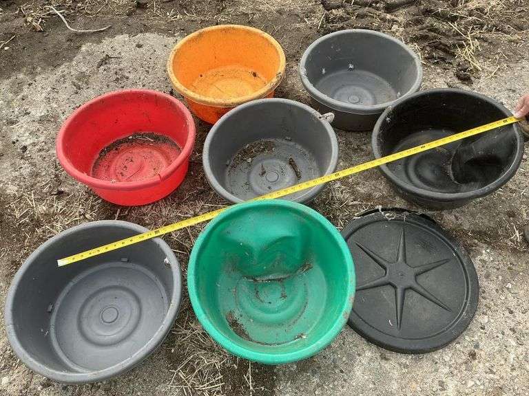 Assorted plastic pans with cracks