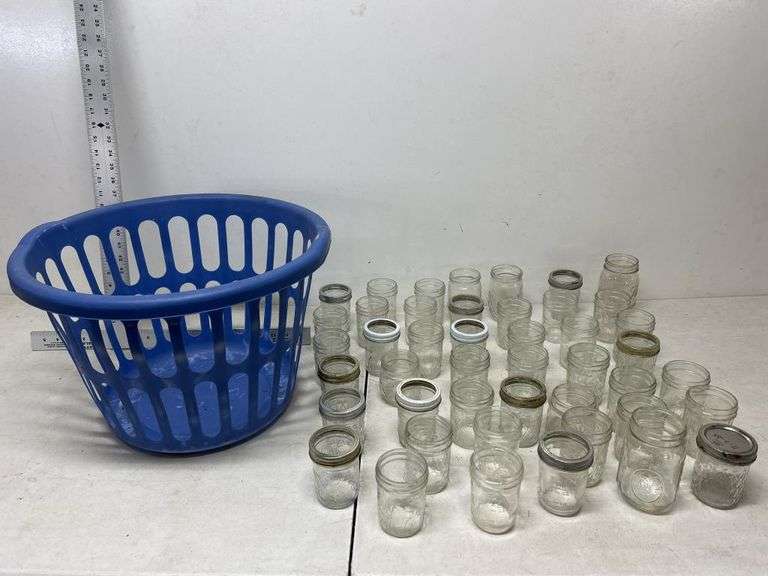 Assorted jelly jars with basket