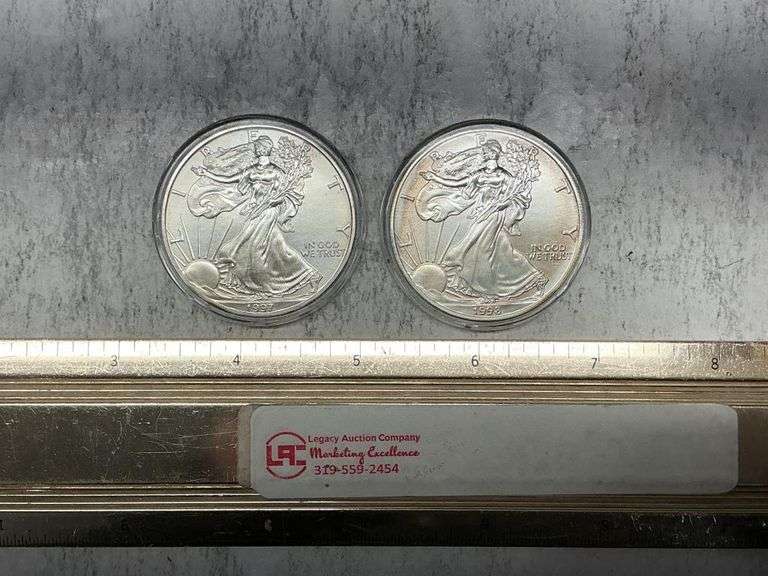 2- American Eagle silver dollars 1997, 98