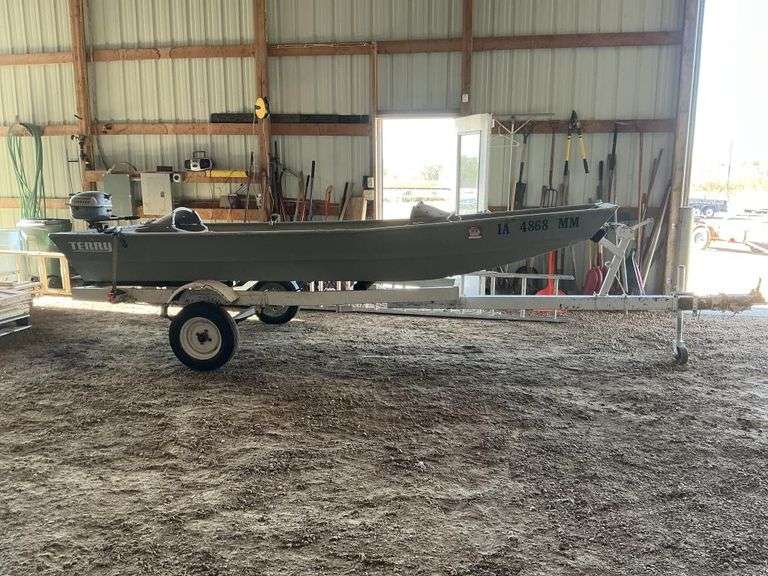 14' john boat with trailer and Evinrude motor,