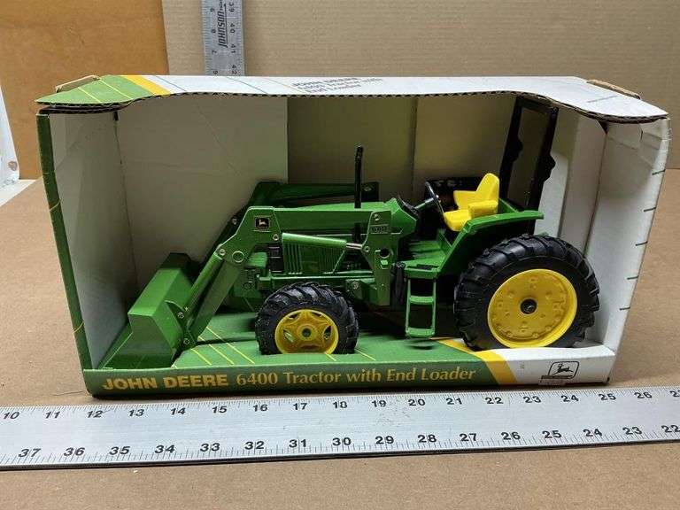 John Deere 6400 tractor with end loader