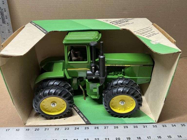 John Deere four-wheel-drive tractor
