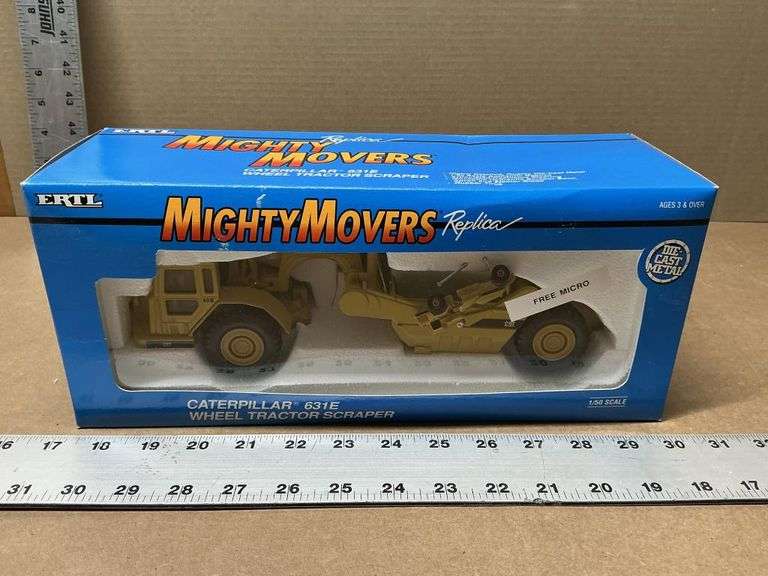 Mighty Movers Caterpillar 631E wheel tractor