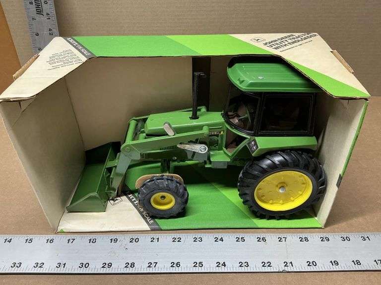 John Deere utility tractor with end loader