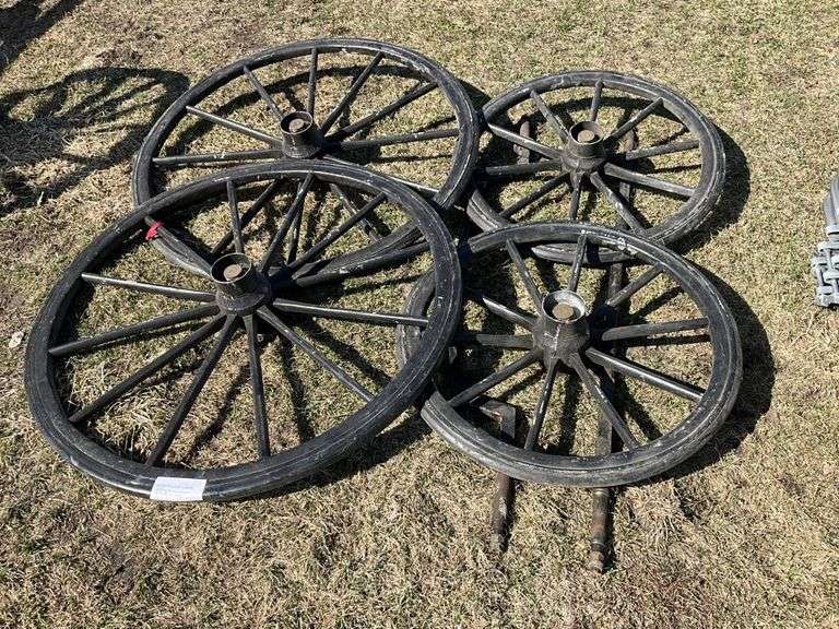 4 wood wheels with axles