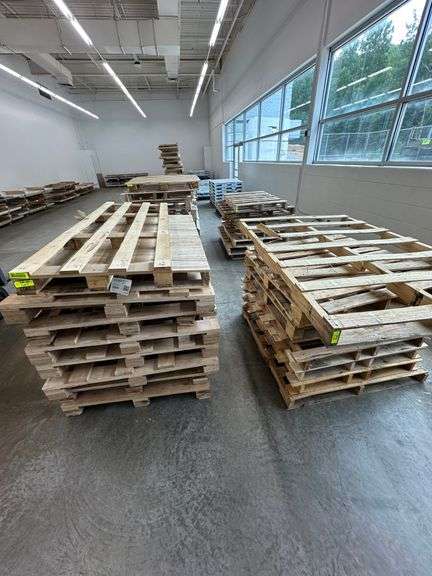 Stacks of Random Pallets - Lambrecht Auction, Inc.