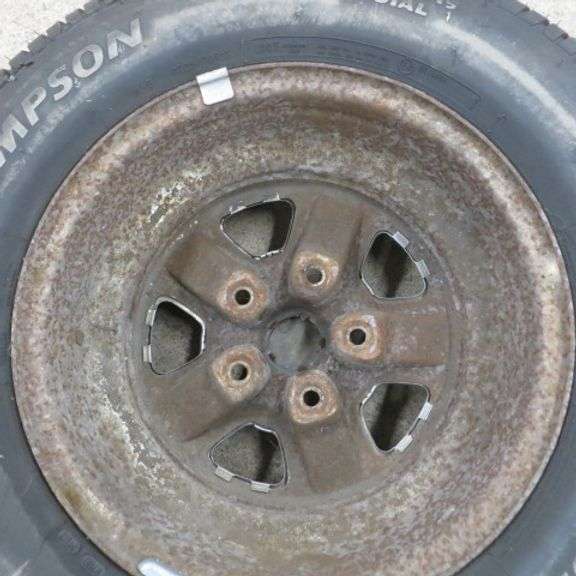 New Mickey Thompson P225/70R15 Tire on Rim - Lambrecht Auction, Inc.